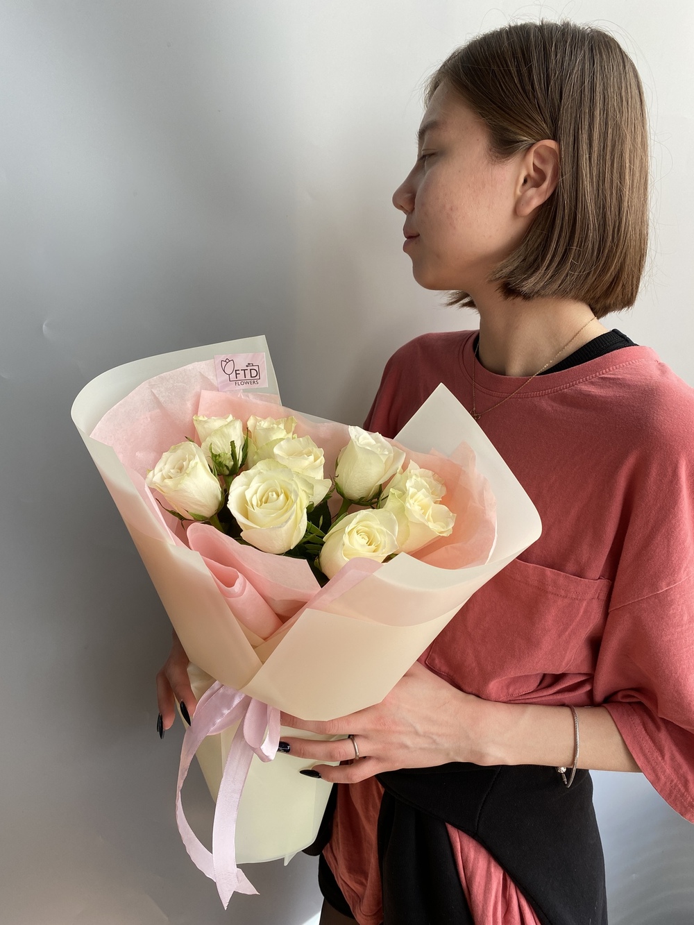 Bouquet of 9 white roses 40-50cm flowers delivered to Astana