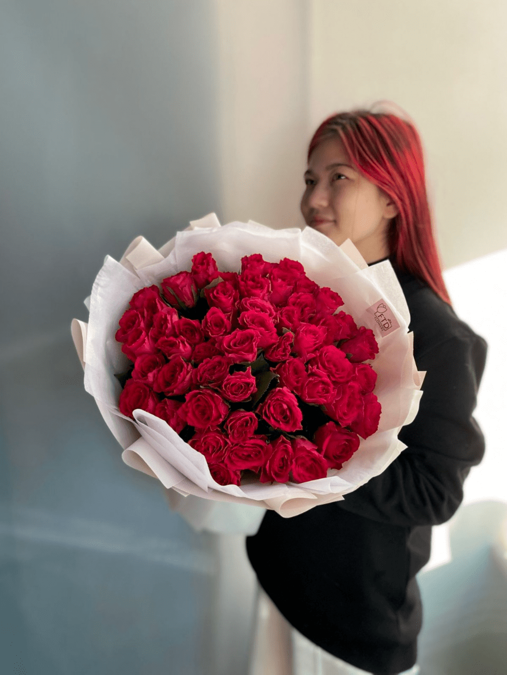 Bouquet of 51 crimson rose 40-50cm51 crimson rose 40-50cm flowers delivered to Astana