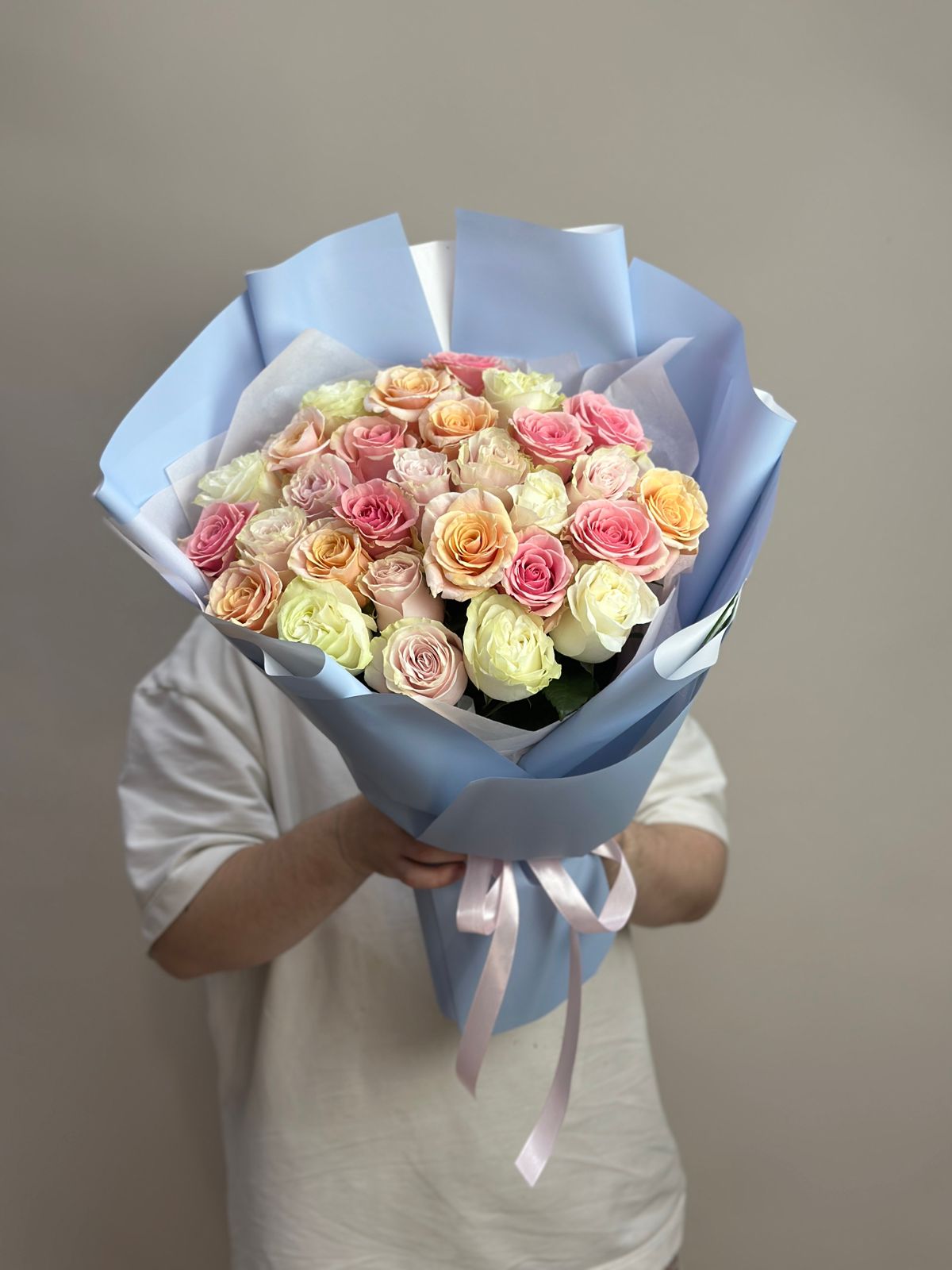 Bouquet of 25 roses mix delicate flowers delivered to Astana