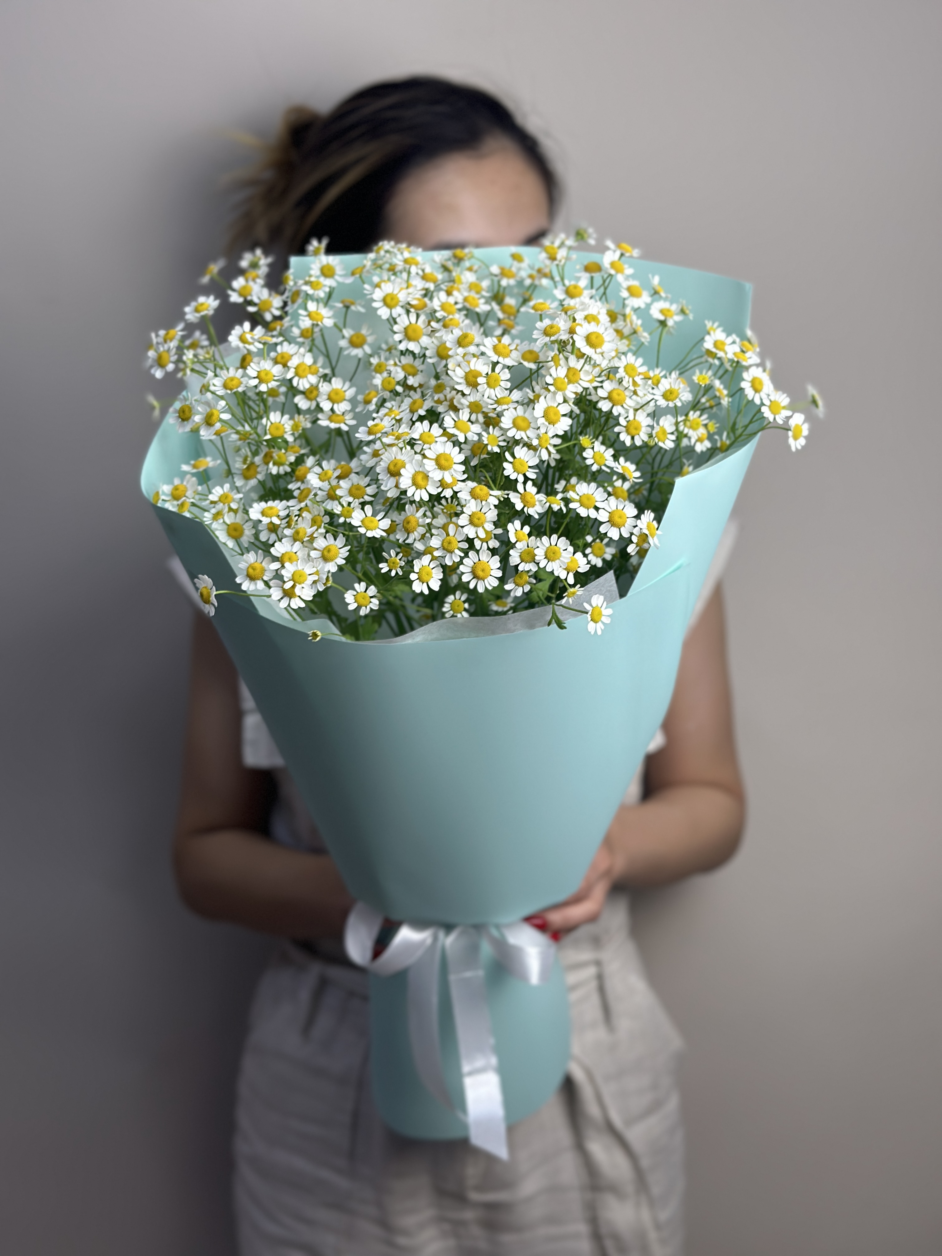 Bouquet of field daisies flowers delivered to Astana