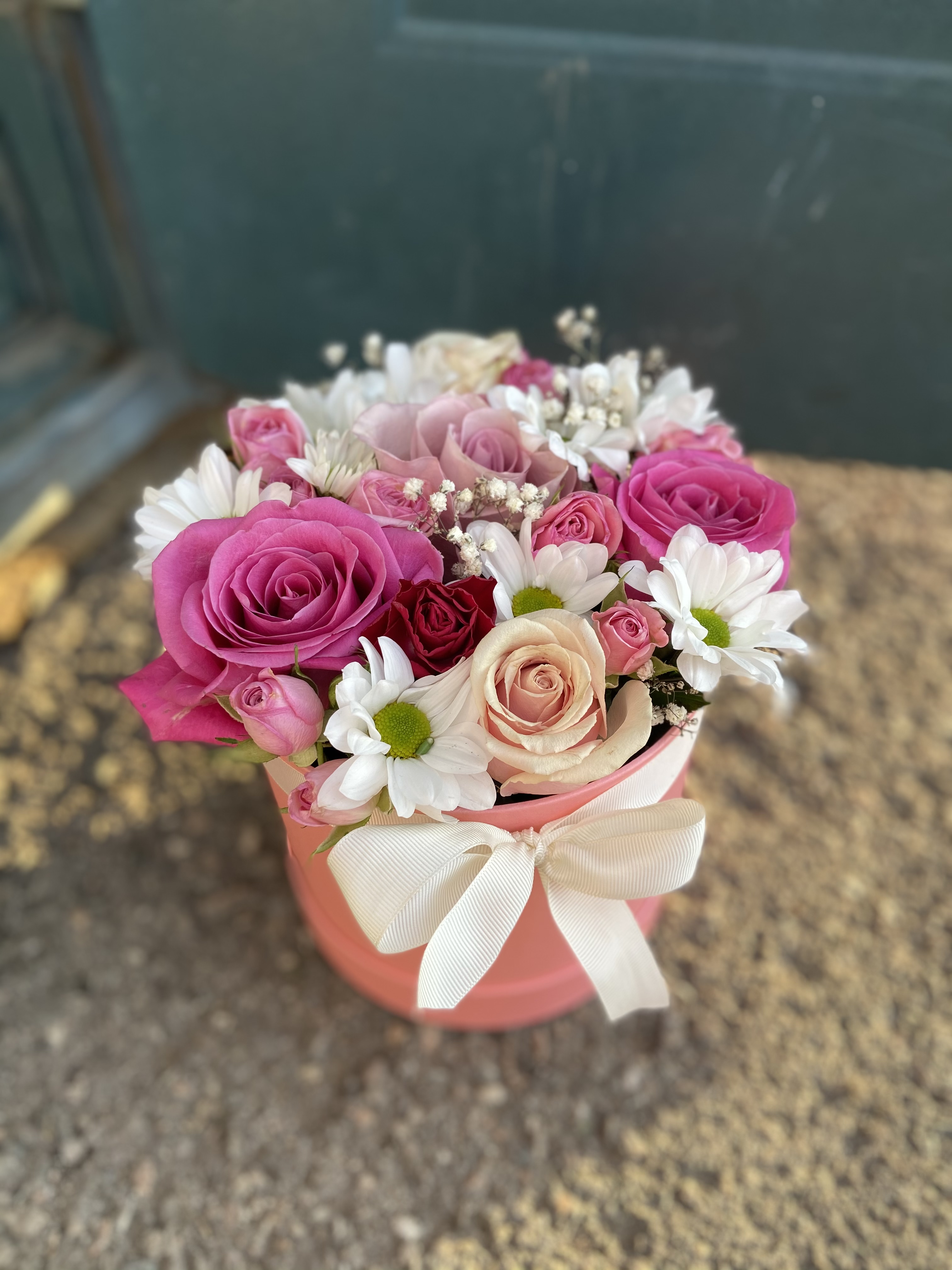 Bouquet of Mini composition in a box flowers delivered to Kostanay.