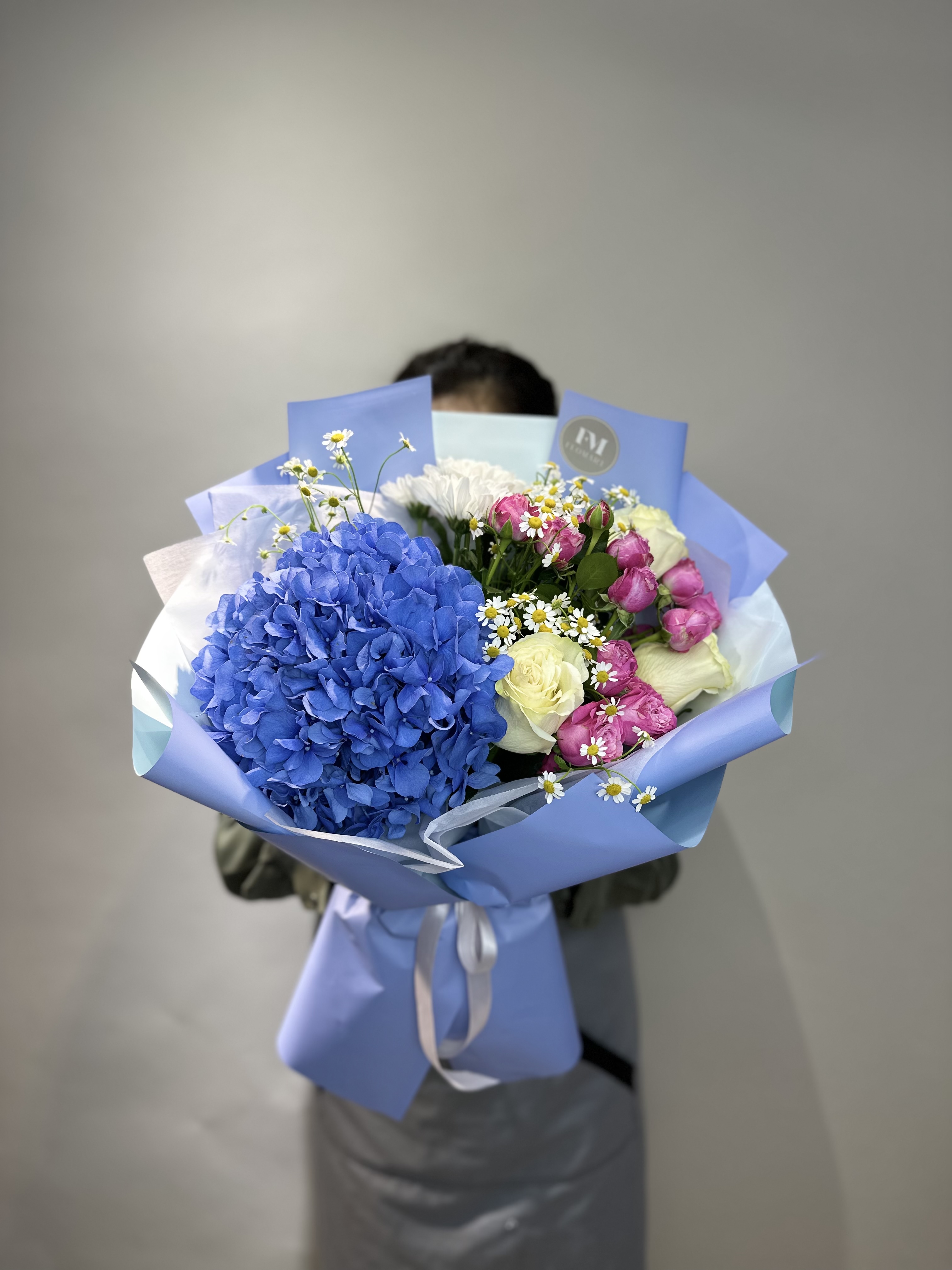 Bouquet of blue symphony flowers delivered to Astana