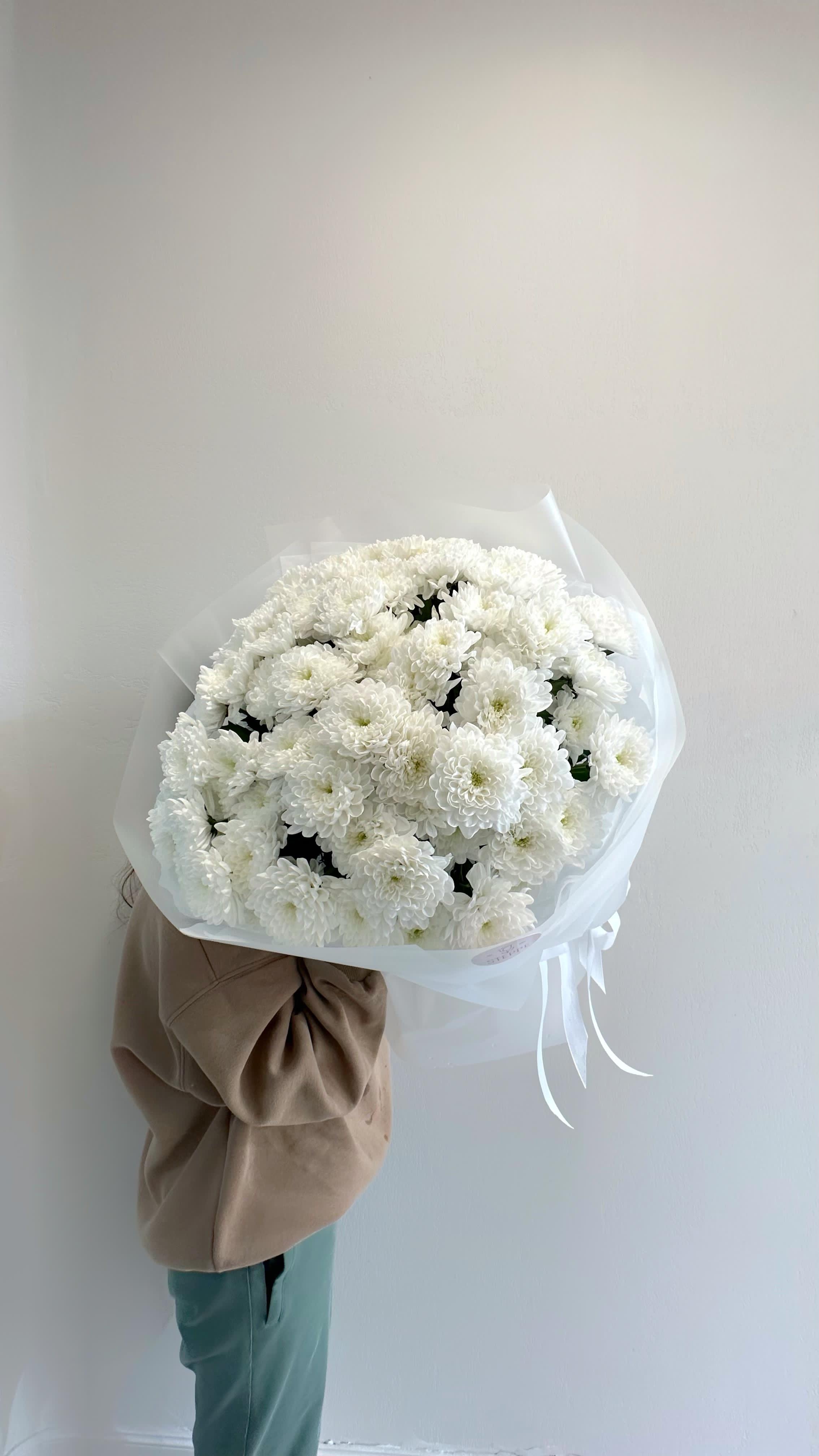 Bouquet of Snow white flowers delivered to Shymkent