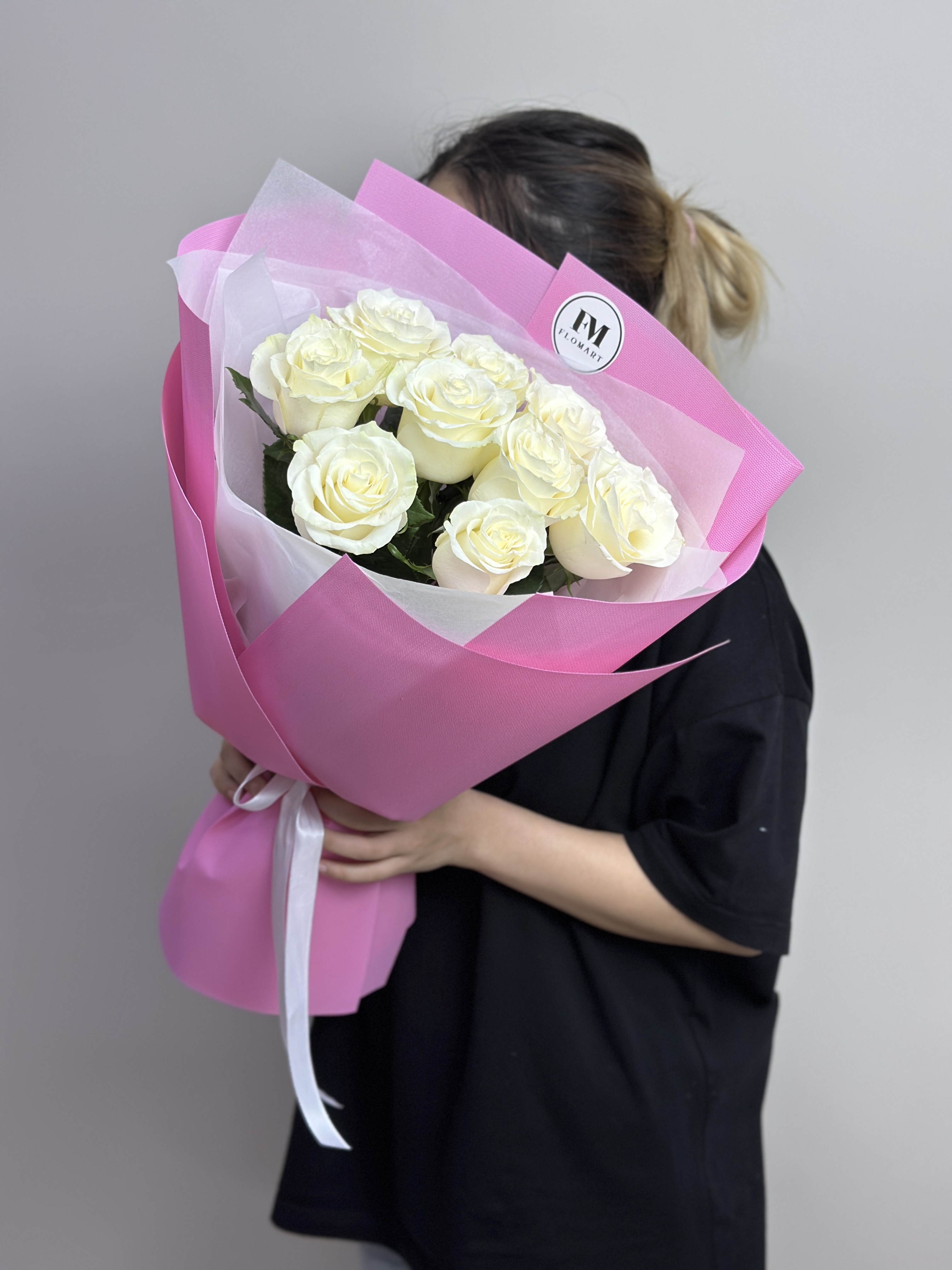 Bouquet of 9 white roses flowers delivered to Astana