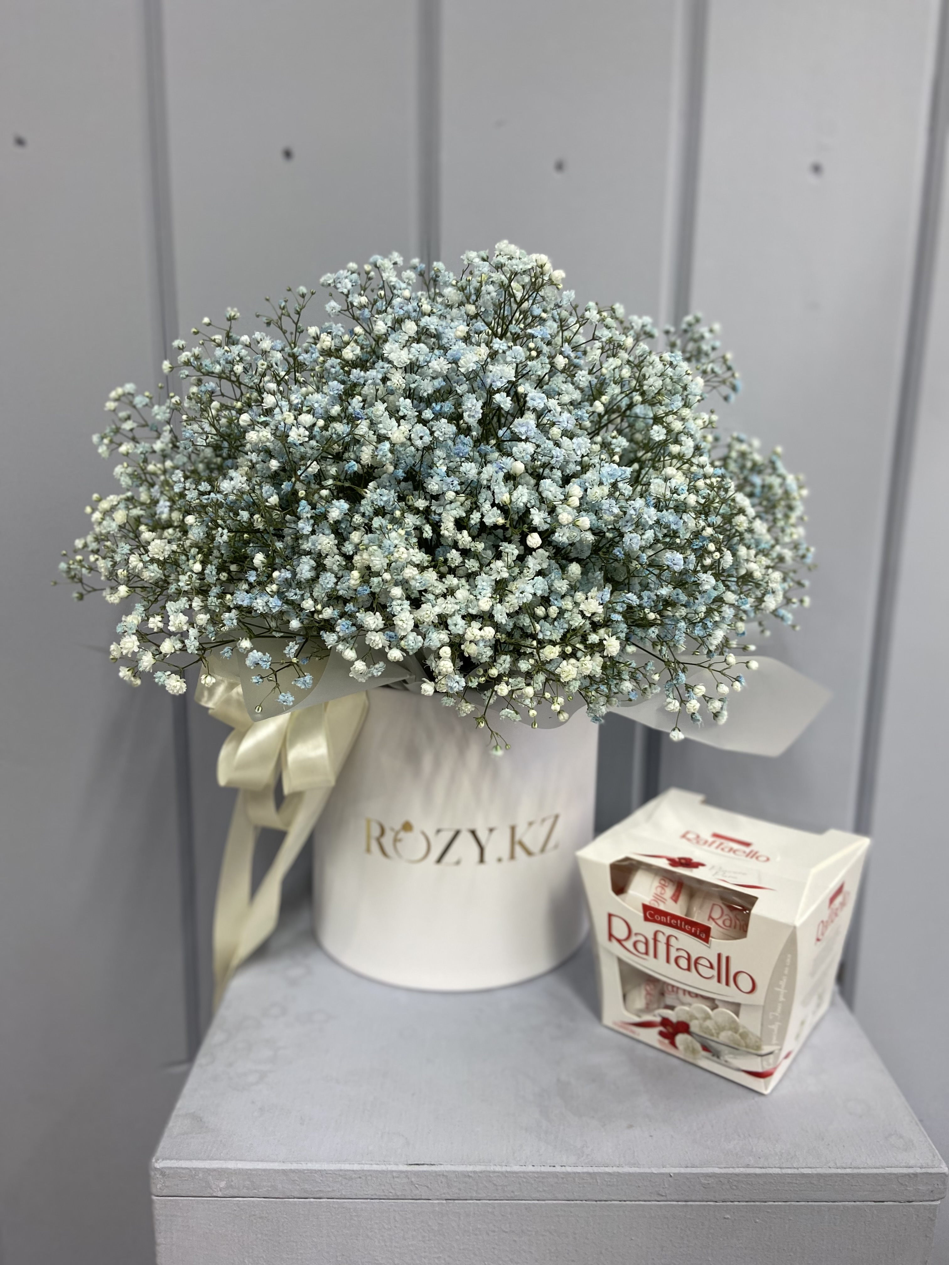 Bouquet of Box size M made of blue gypsophila and Rafaelo flowers delivered to Astana