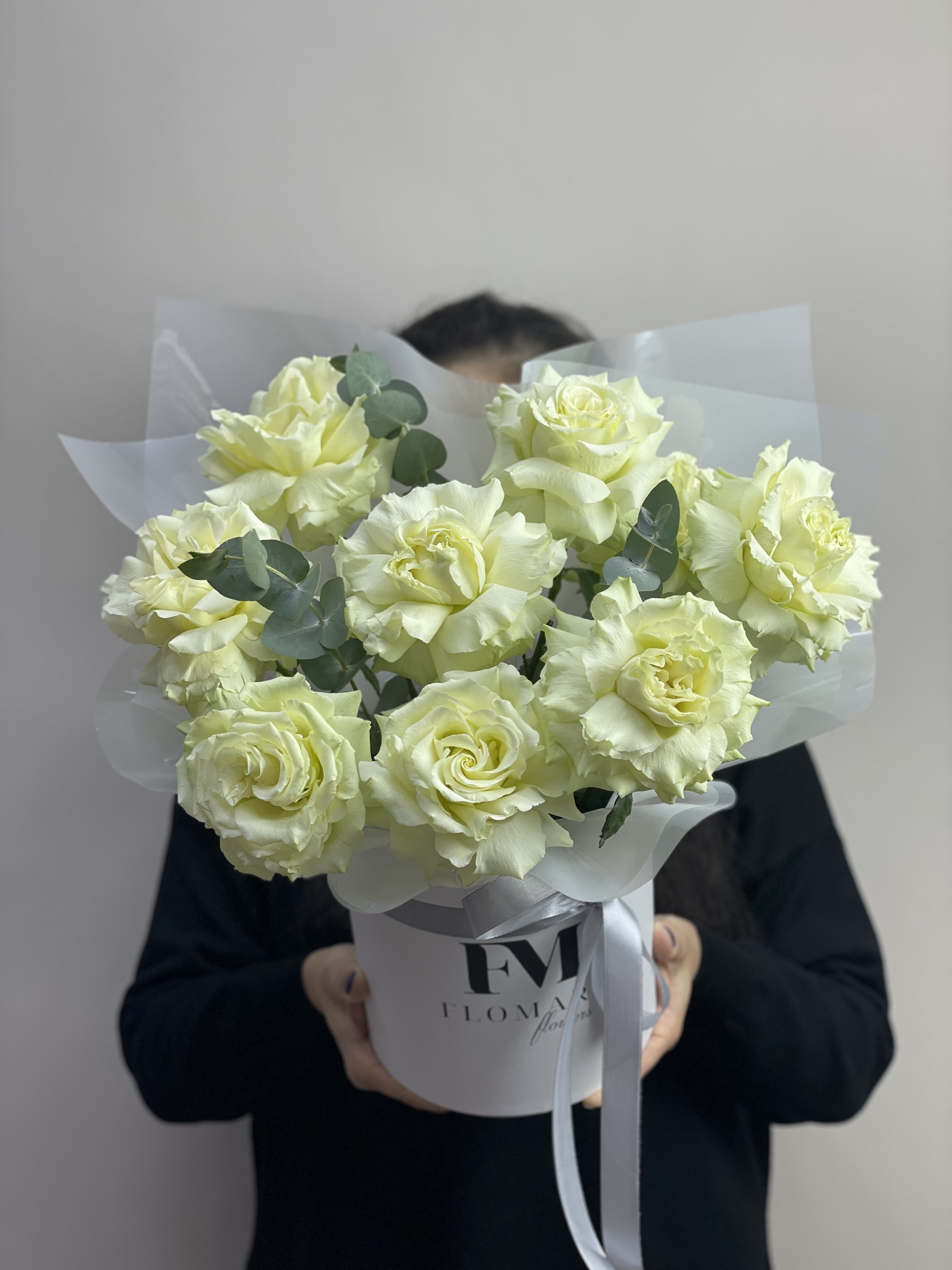 Bouquet of composition of open roses flowers delivered to Astana