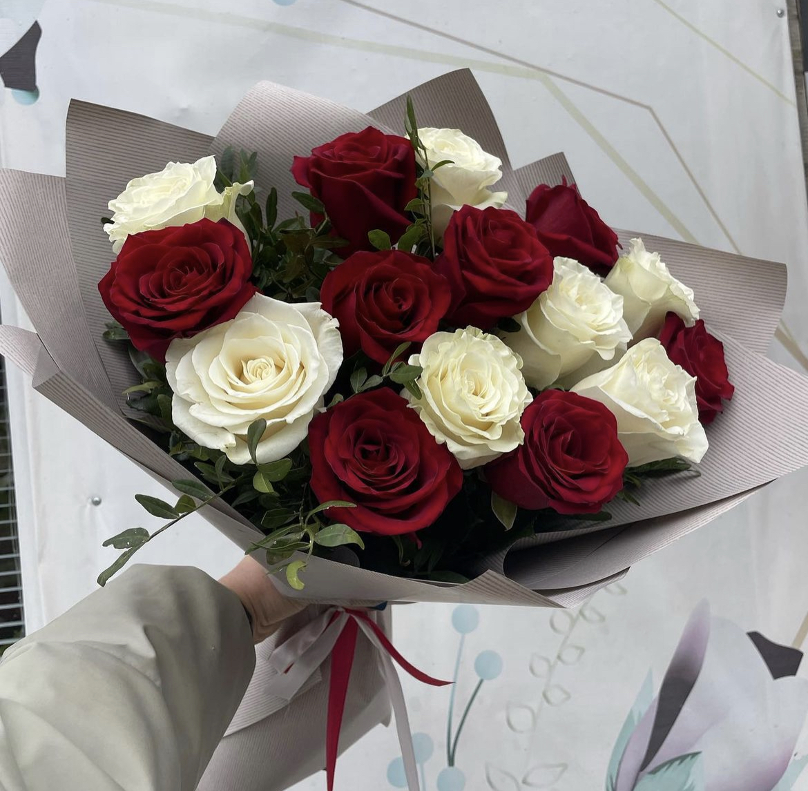 Bouquet of Red and white roses flowers delivered to Kostanay.