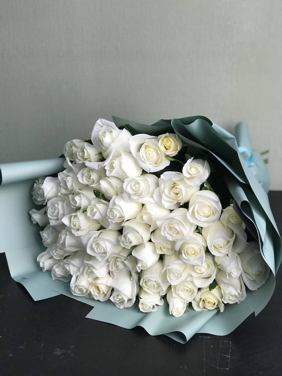 Bouquet of White roses flowers delivered to Uralsk