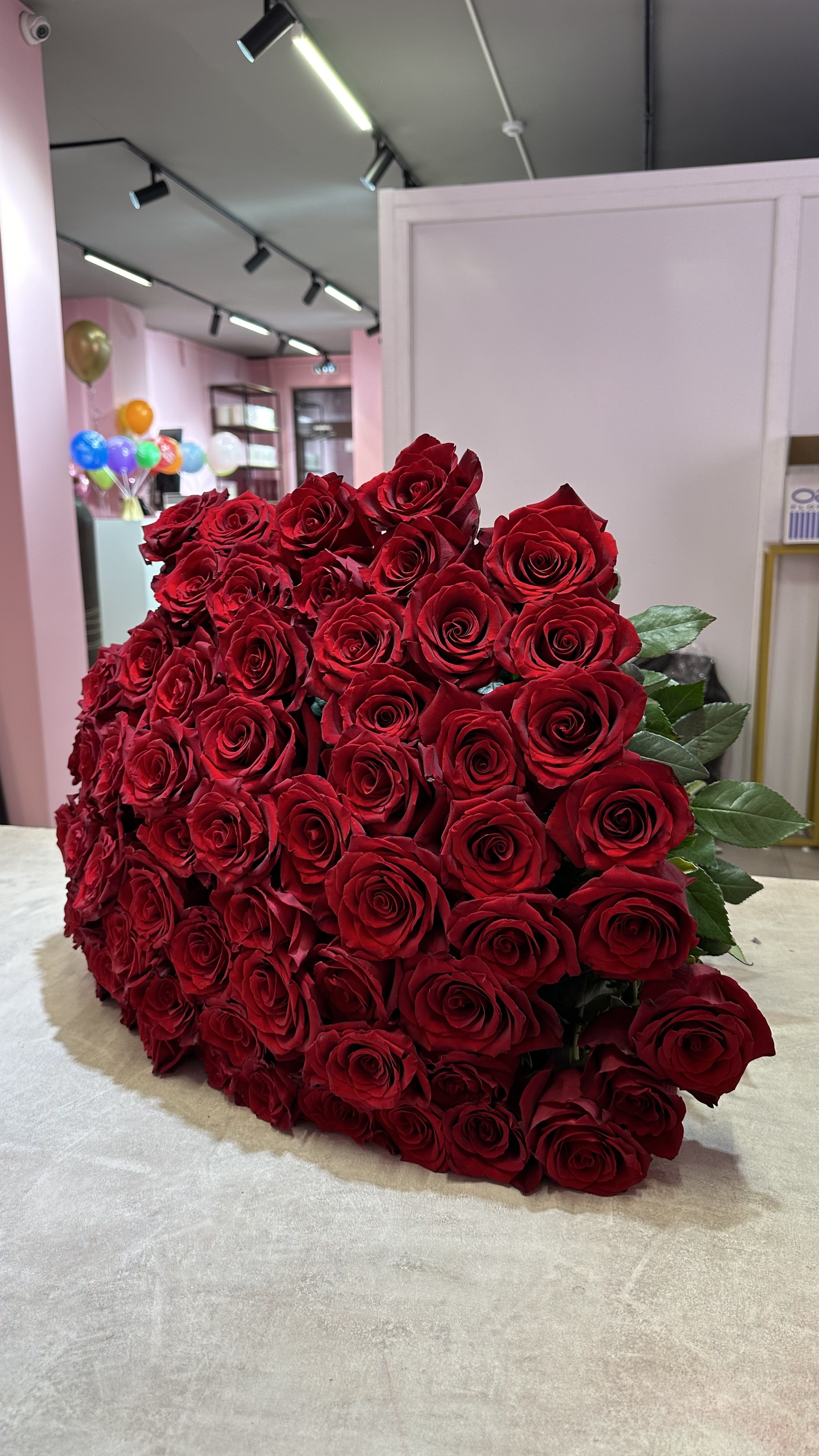 Bouquet of Bouquet of Dutch meter roses with ribbon flowers delivered to Astana