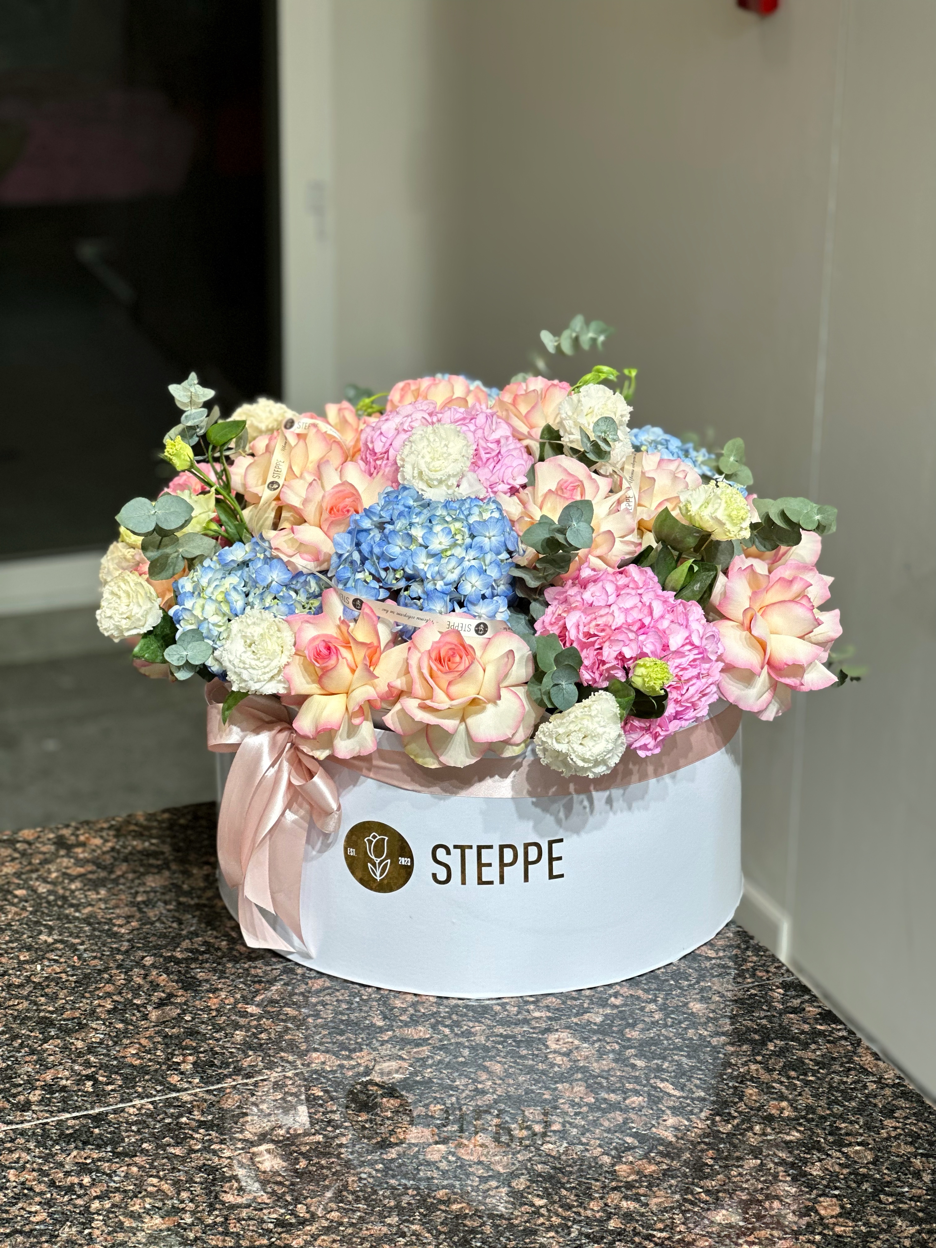 Bouquet of box L flowers delivered to Shymkent