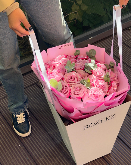 Bouquet with French roses and eucalyptus in a carrier with delivery to Astana