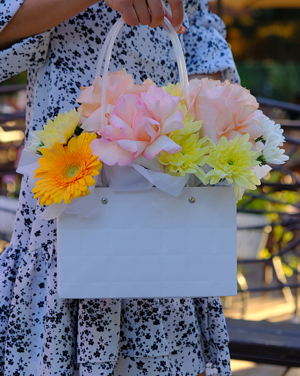 Bouquet of Delicate composition in a handbag flowers delivered to Taraz