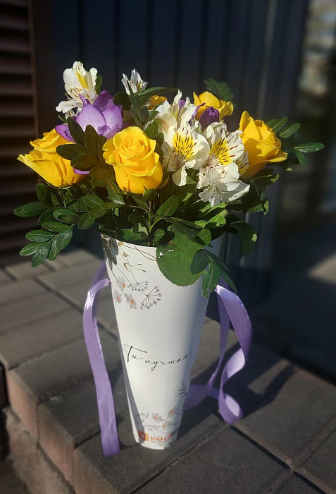 Bouquet in a paper vase