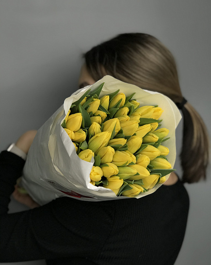 Bouquet of Yellow tulips in a pack wholesale 50 pcs flowers delivered to Astana
