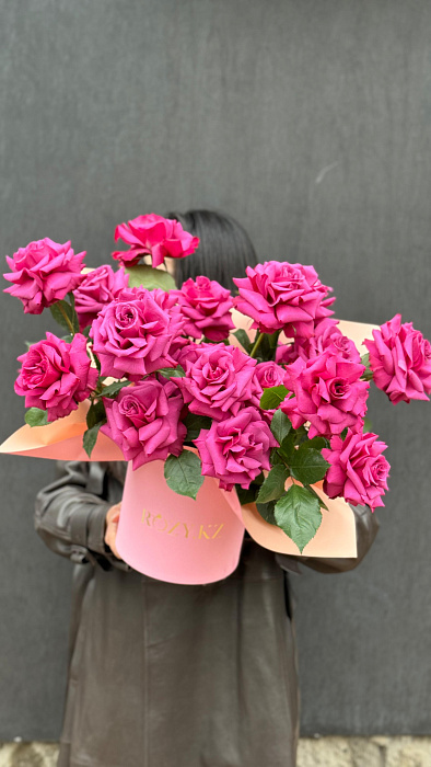 Stylish composition of 19 French roses