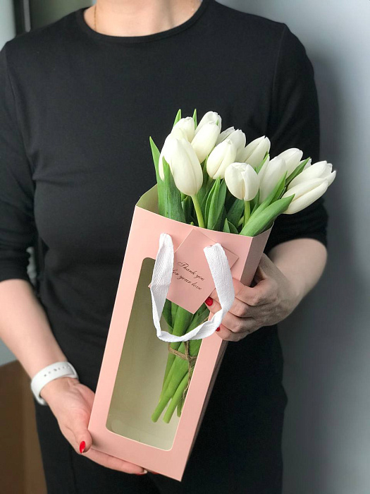 White tulips in a gift box