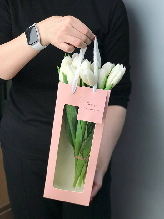 White tulips in a gift box