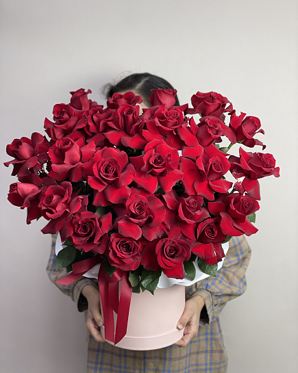 Bouquet of 25 red roses in a hatbox flowers delivered to Astana