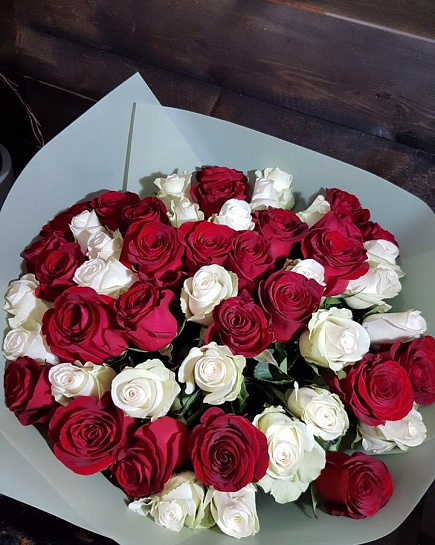 Bouquet of Red and white mix of roses flowers delivered to Kostanay.