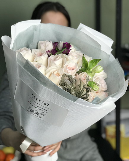 Bouquet of The first ray of spring flowers delivered to Rudniy
