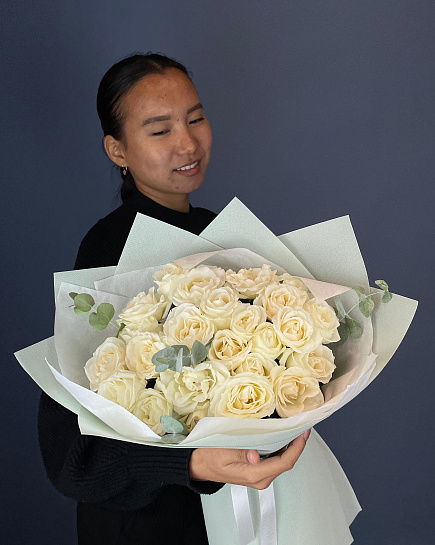 Bouquet of 25 white roses with added greenery with delivery to Astana