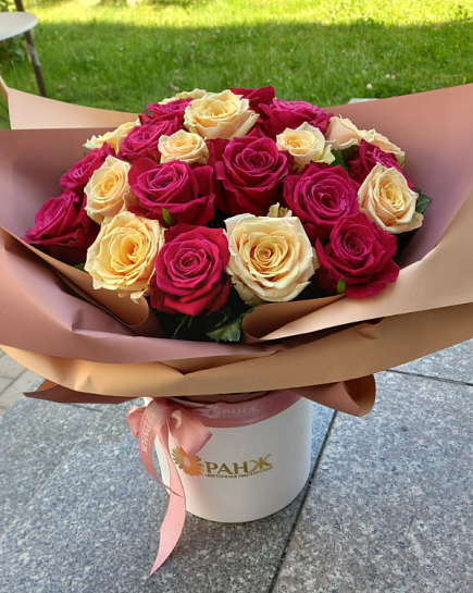 Bouquet of Red and yellow Dutch roses in a box flowers delivered to Almaty
