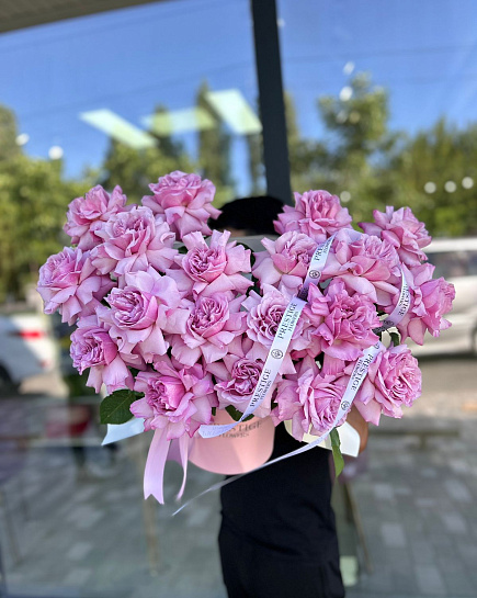 Bouquet of composition of open roses flowers delivered to Shymkent