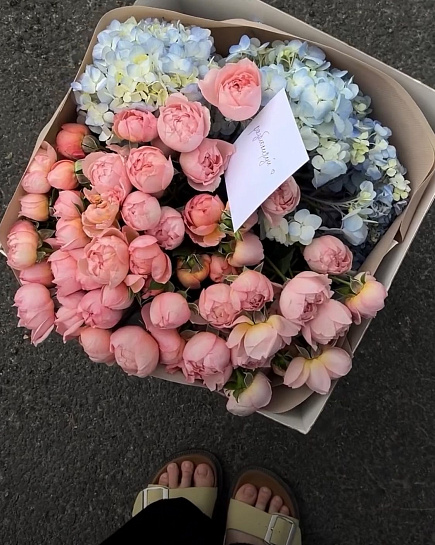 Bouquet of Bouquet in a carrier flowers delivered to Shymkent