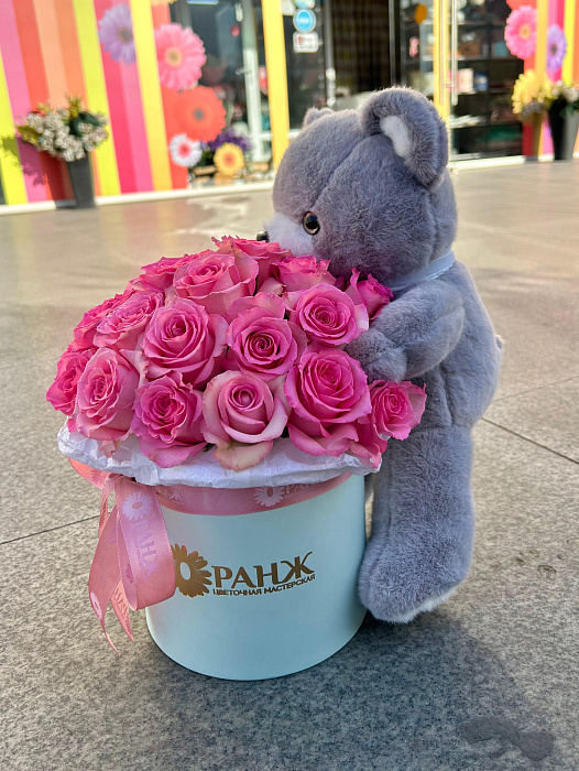 Roses with a teddy bear