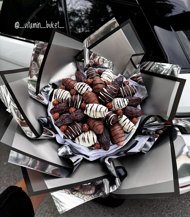 Bouquet of dates in chocolate with nut filling