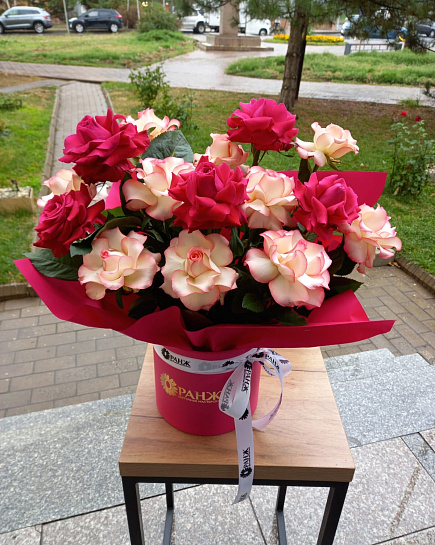 Bouquet of Red and pink roses in a hat box flowers delivered to Almaty