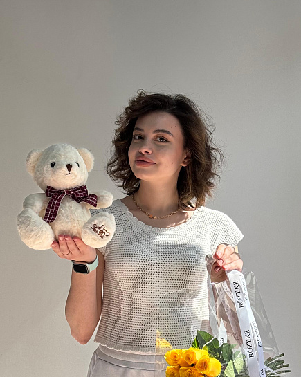 Composition of a handbag with roses and a teddy bear with delivery to Astana