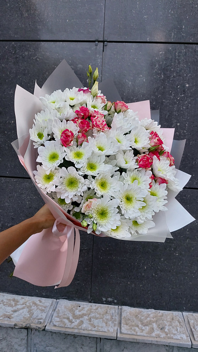 An armful of chrysanthemums with addition