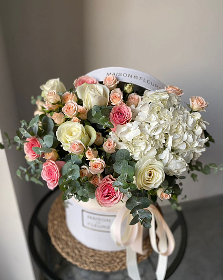 Mix of roses with hydrangeas in a box with delivery to Almaty