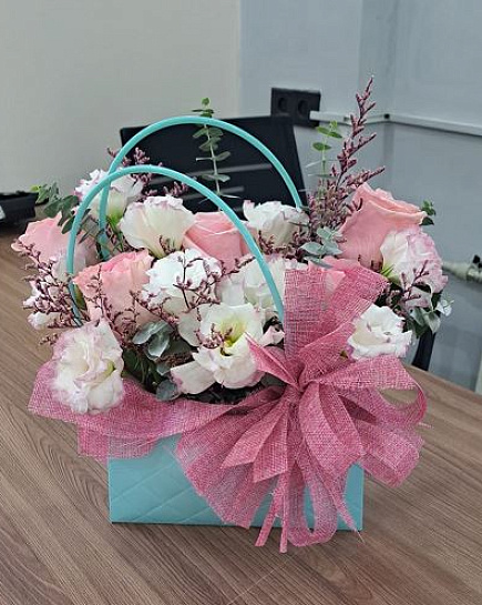 Handbag with roses and lisianthus with delivery to Almaty