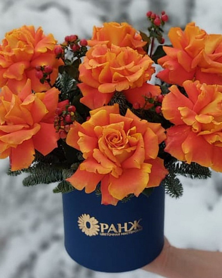 Bouquet of 7 French roses in a box with delivery to Almaty