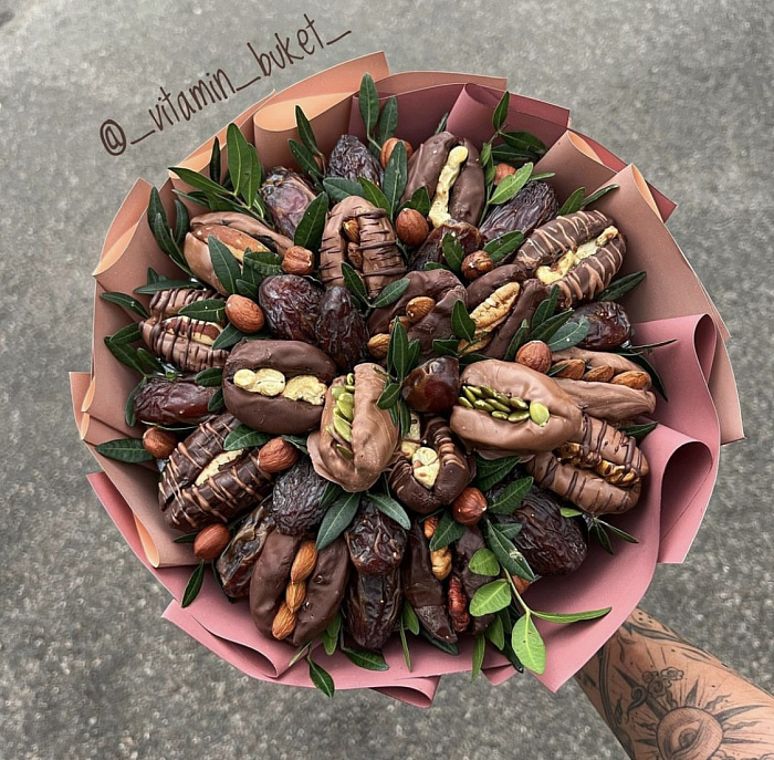 Bouquet of dates in chocolate with nut filling