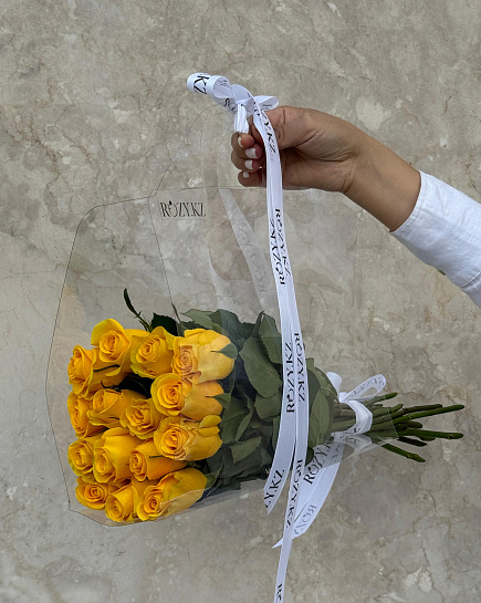 Bouquet of 15 yellow roses in a transparent bag flowers delivered to Astana