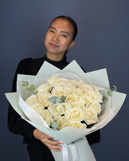 Bouquet of 25 white roses with added greenery with delivery to Astana