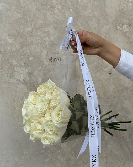 15 white roses in a transparent bag with delivery to Astana