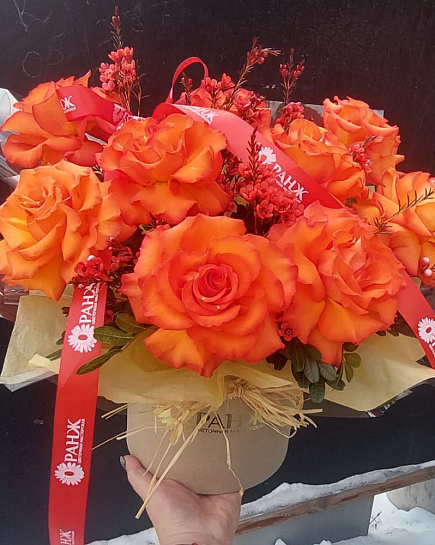 Bouquet of 9 French roses in a box with delivery to Almaty