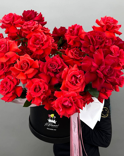 Bouquet of Red roses in a hat box flowers delivered to Almaty