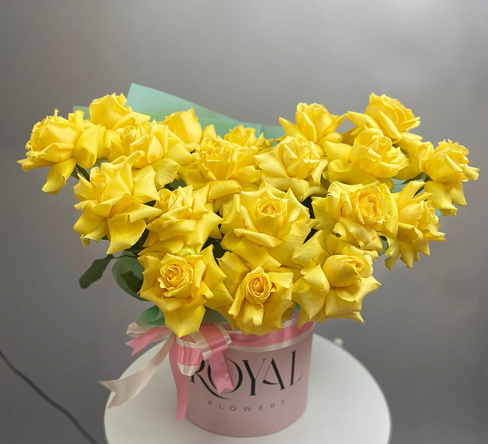 19 yellow roses in a medium box